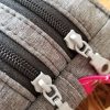 twist_softshell_gris_coton_rose__detail_curseurs_fermes